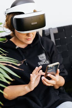 Woman using VR headset and smartphone, exploring technology interaction.